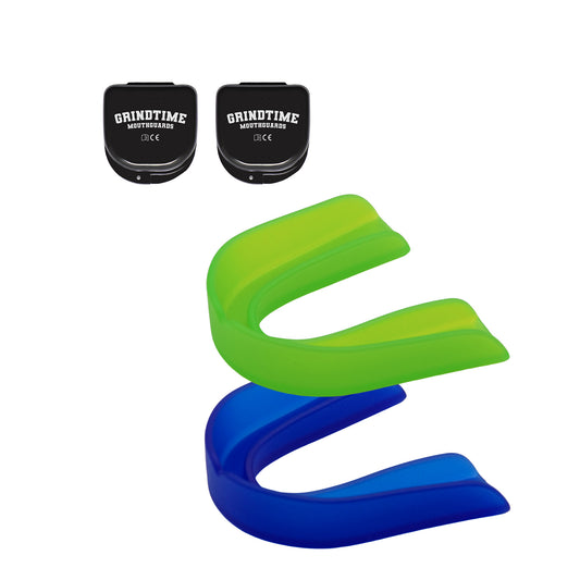 Two GT Performance Mouthguards, green and blue, with two black cases in the left upper corner